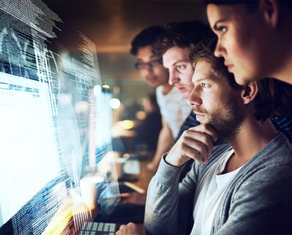 workers staring at a screen