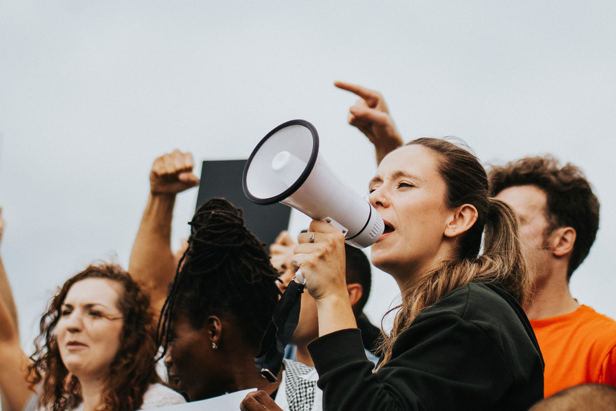 Women’s voice: women speaks through a megaphone